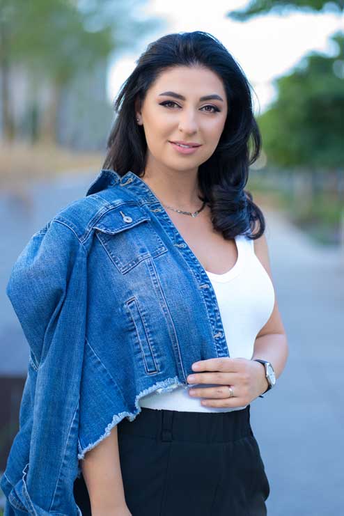 Seda Stepanyan - Professional Real Estate Agent in denim jacket